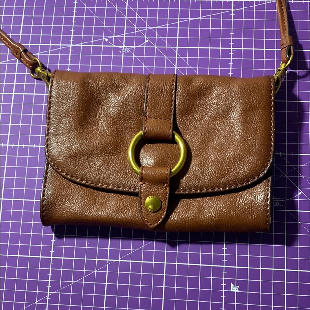 Reduced Frye Cognac Leather Harness Crossbody Bag with Gold Ring Accent.